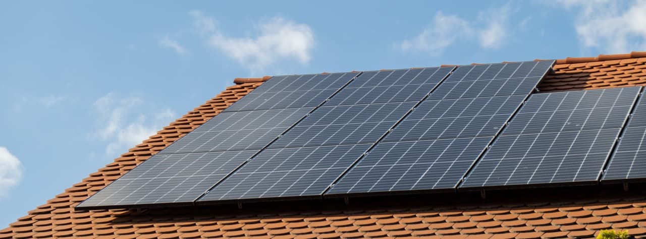 House with rooftop solar panels